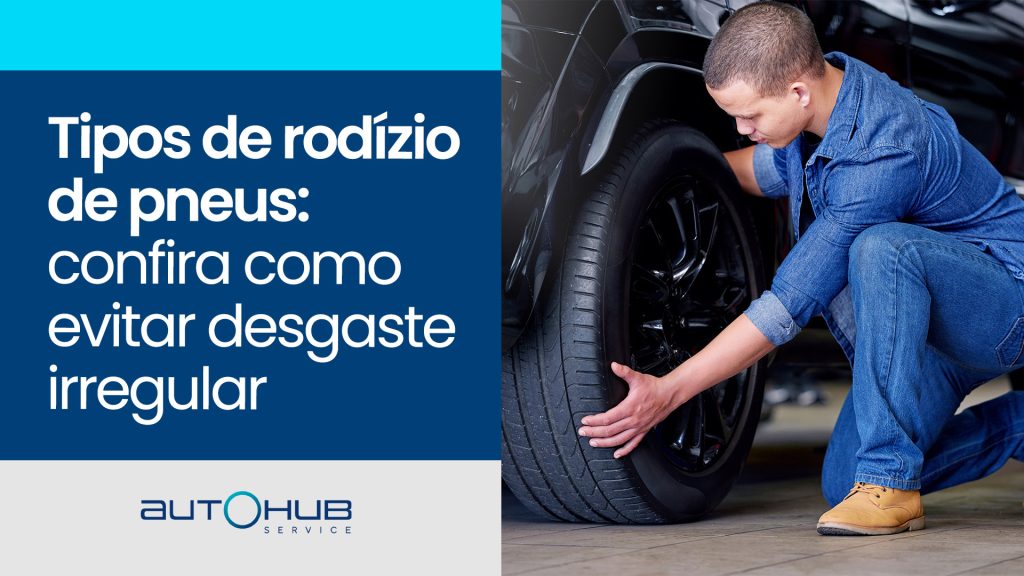 Homem, mecânico de automóveis e troca de pneus na garagem, manutenção ou serviço de veículos. Especialista, profissional a.